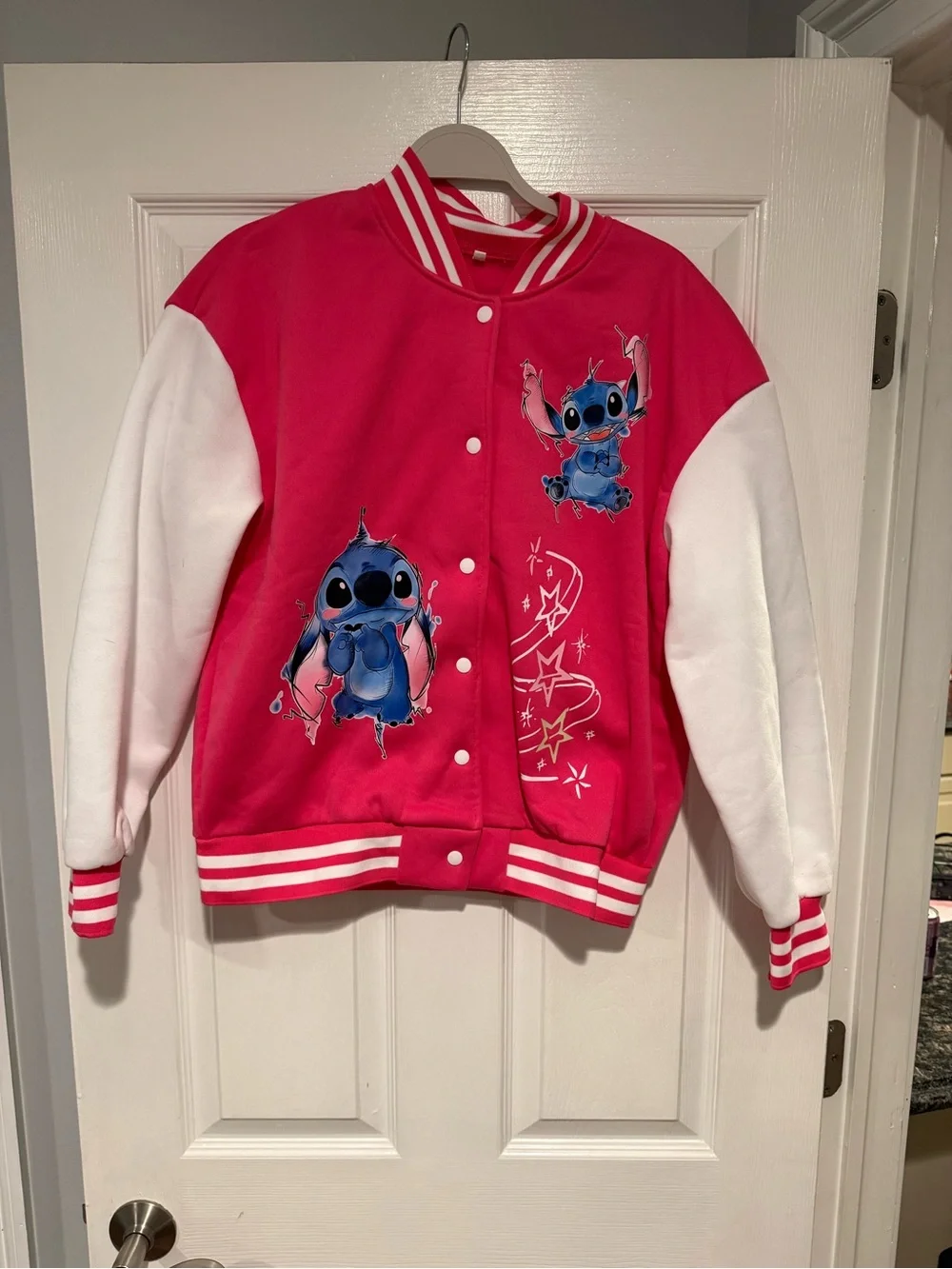 Juniors Pink and White Cartoon Stitch Varsity Jacket